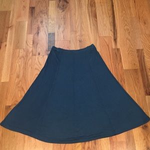 Peacock blue A-line midi skirt by Winter Silks